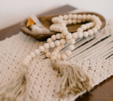 wooden beaded garland with tassels