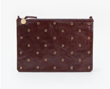 clare v walnut grommet flat clutch with tabs at maeree